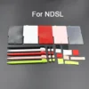 Conjuntos de Capas de Bateria + Tampões de Borracha + Caneta Stylus para Nintendo DS Lite (NDSL)